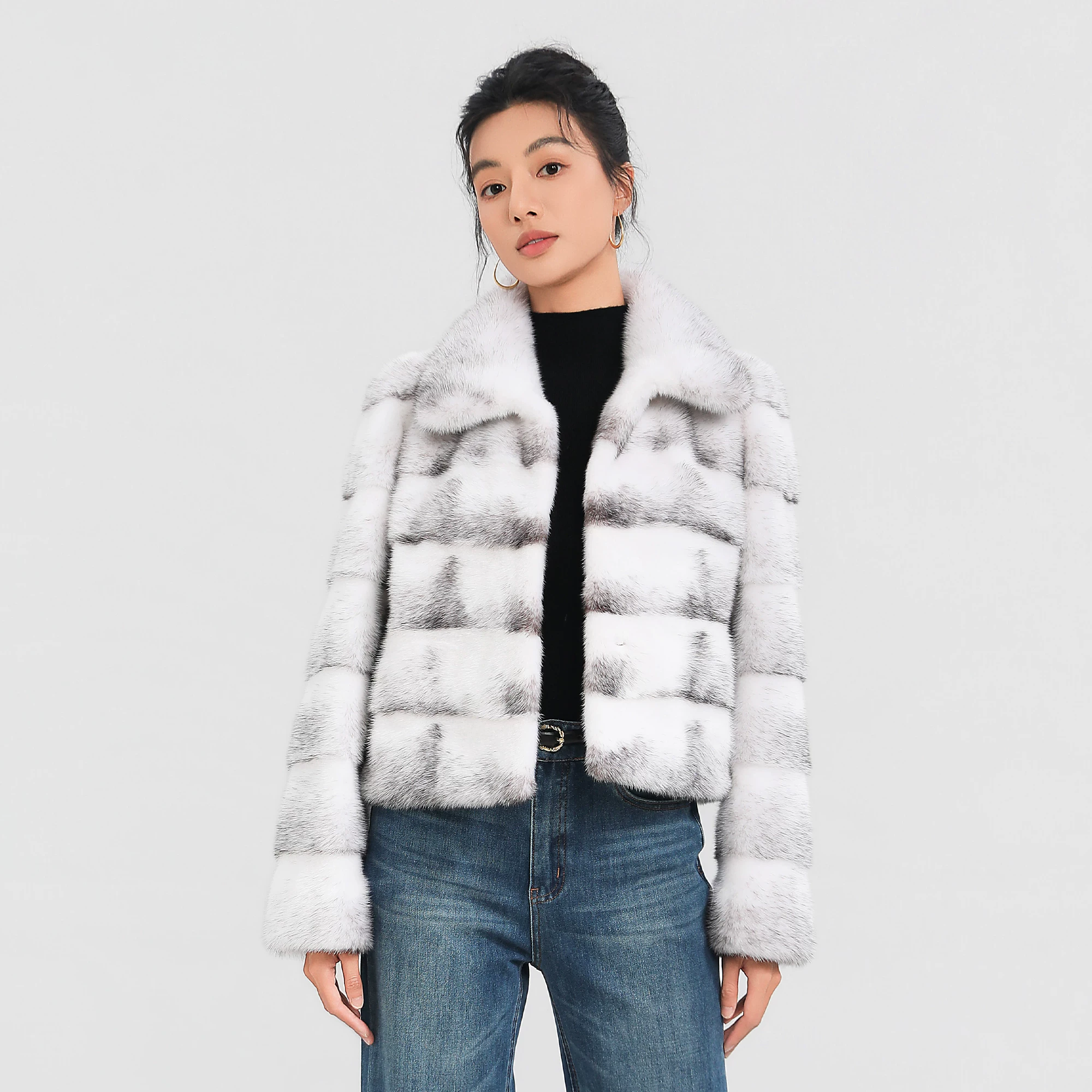 Women's elegant, minimalist, and versatile short-length natural-color Cross Mink fur coat with a lapel collar